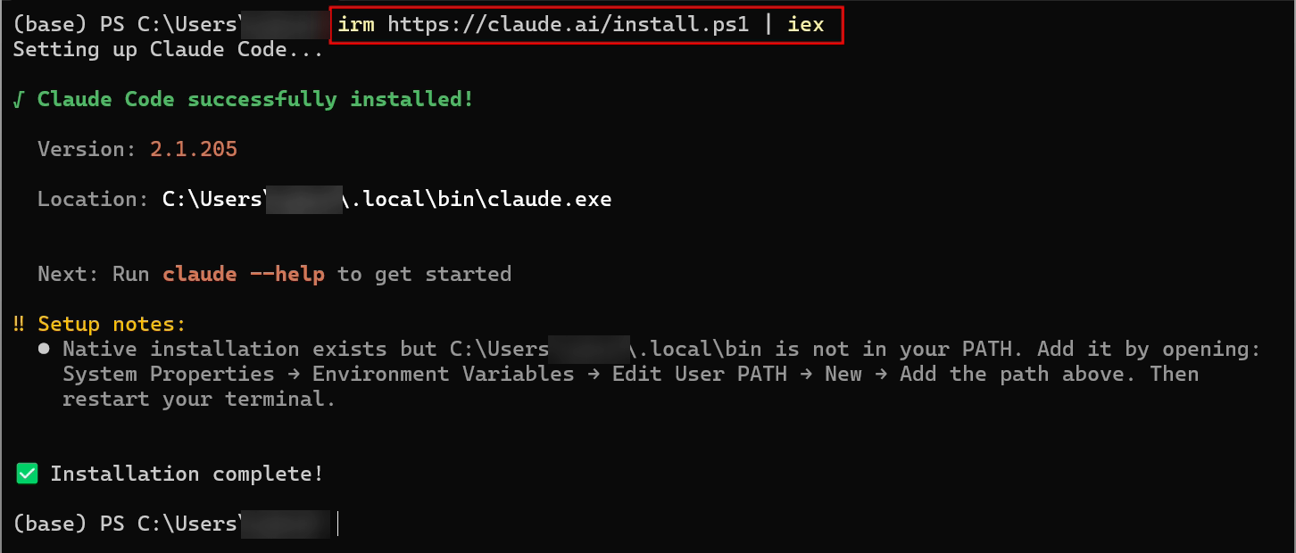 PowerShell com o comando irm https://claude.ai/install.ps1 | iex, a mensagem verde “Claude Code successfully installed!”, a versão 2.1.205, a pasta .local\bin\claude.exe, um aviso amarelo de PATH e “Installation complete!”